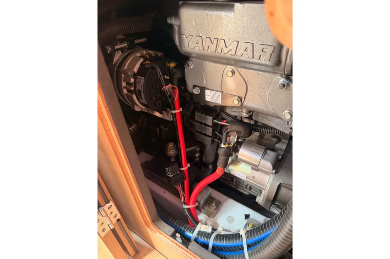 Slide: The Image of Engine compartment of 2024 Jeanneau Sun Odyssey 380 sailboat with Yanmar engine. - 80