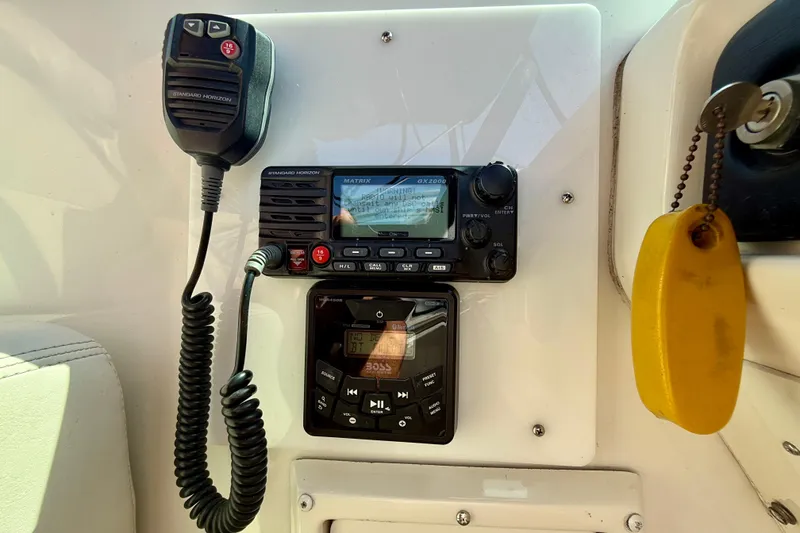 Slide: The Image of VHF radio and control panel on 2000 Carver 53 Voyager yacht. - 82