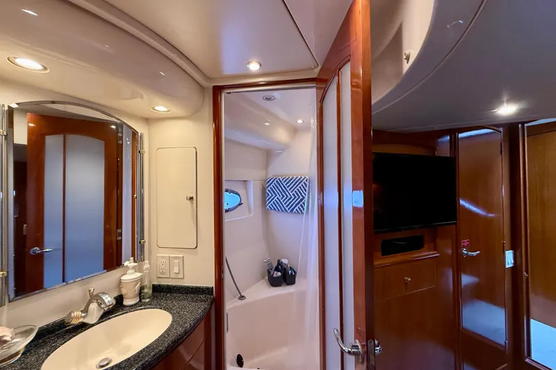 Slide: The Image of Luxurious bathroom interior of 2000 Carver 53 Voyager yacht with modern amenities. - 49