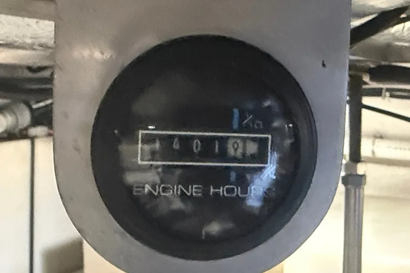 Slide: The Image of Engine hour meter showing 1401 hours on a 2000 Carver 53 Voyager. - 103