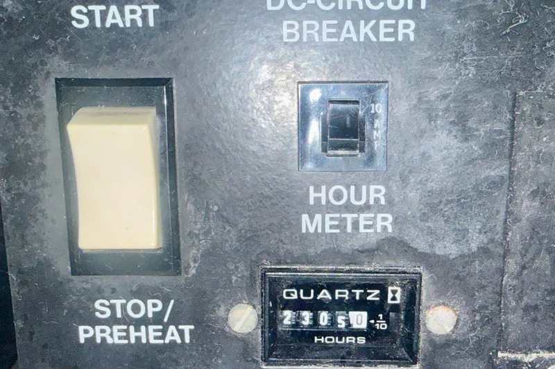 Slide: The Image of Control panel of a 2000 Carver 53 Voyager with hour meter reading 2305 hours. - 104