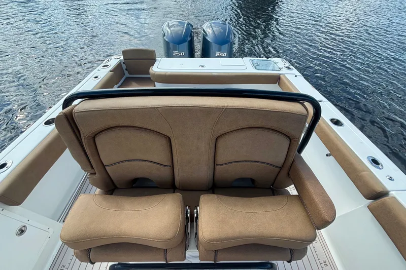 Slide: The Image of 2021 Sea Hunt Gamefish 27FS boat with dual engines and comfortable seating. - 16