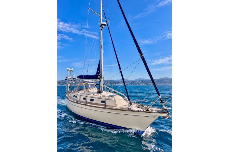 The Image of Sailing yacht Island Packet 380, 2000 model, cruising on clear blue waters. - 0