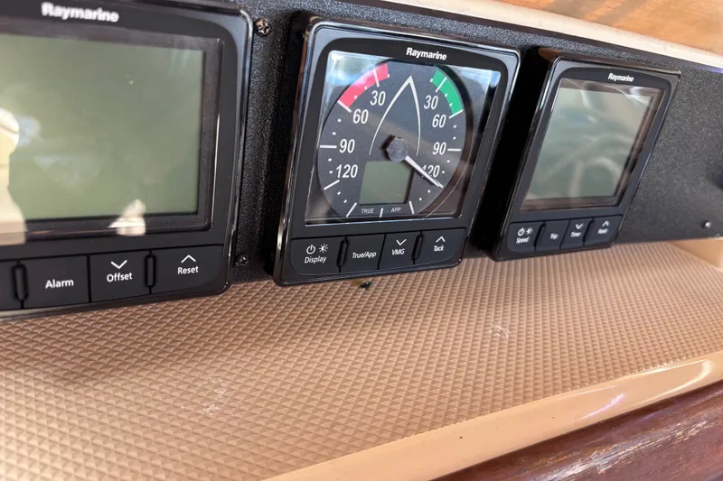 Slide: The Image of Raymarine instrument panel on a 2000 Island Packet 380 sailboat dashboard. - 40