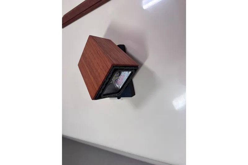 Slide: The Image of Wooden-cased light fixture on Island Packet 380 yacht, 2000 model. - 21