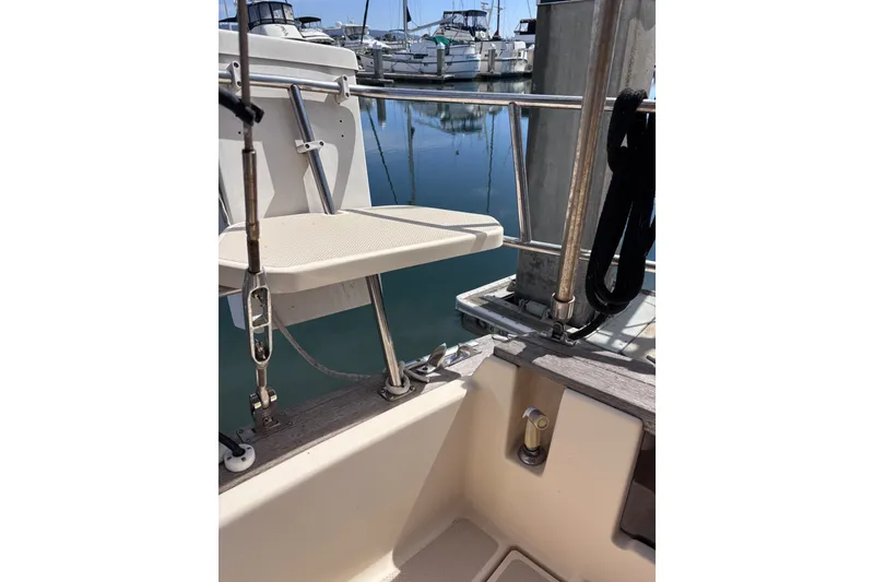 Slide: The Image of Cockpit view of 2000 Island Packet 380 sailboat docked at marina. - 47