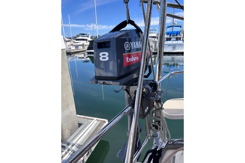 Slide: The Image of Yamaha Enduro 8 outboard motor on Island Packet 380 sailboat, docked in marina. - 39