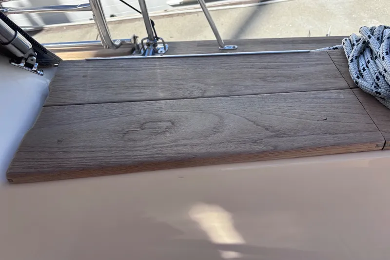 Slide: The Image of Wooden deck detail on a 2000 Island Packet 380 sailboat. - 59