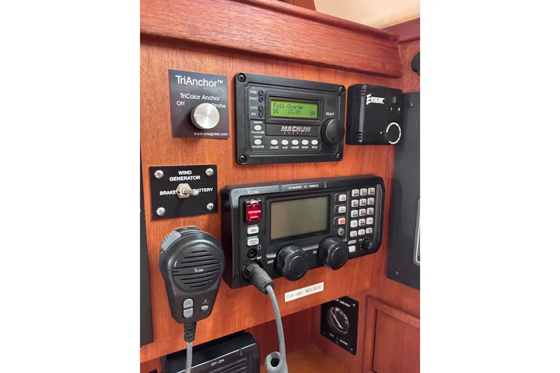 Slide: The Image of Control panel of a 2000 Island Packet 380 sailboat with communication equipment. - 15