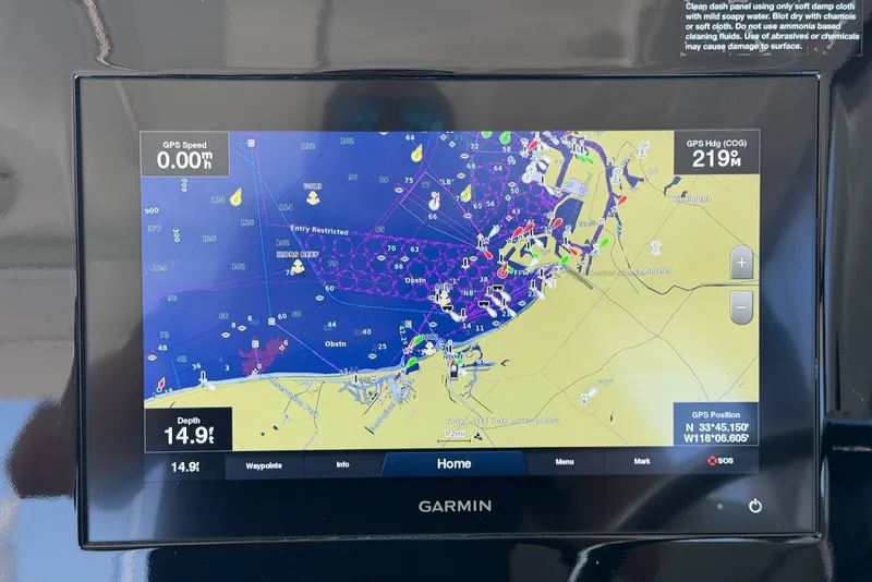 Slide: The Image of Garmin navigation system on a 2021 Pursuit DC 326 Dual Console boat. - 36