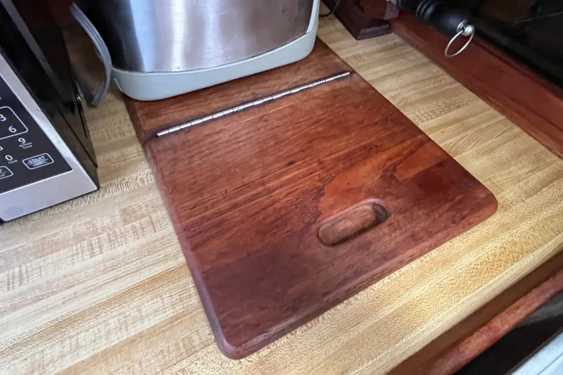 Slide: The Image of Wooden cutting board on a Catalina 30 boat's kitchen counter, 1985 model. - 20