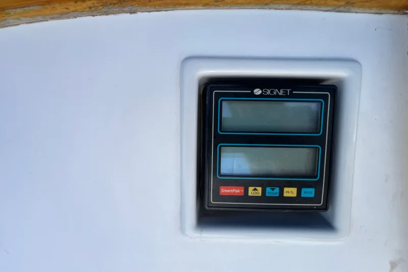 Slide: The Image of Digital display panel on a 1985 Catalina 30 sailboat dashboard. - 12