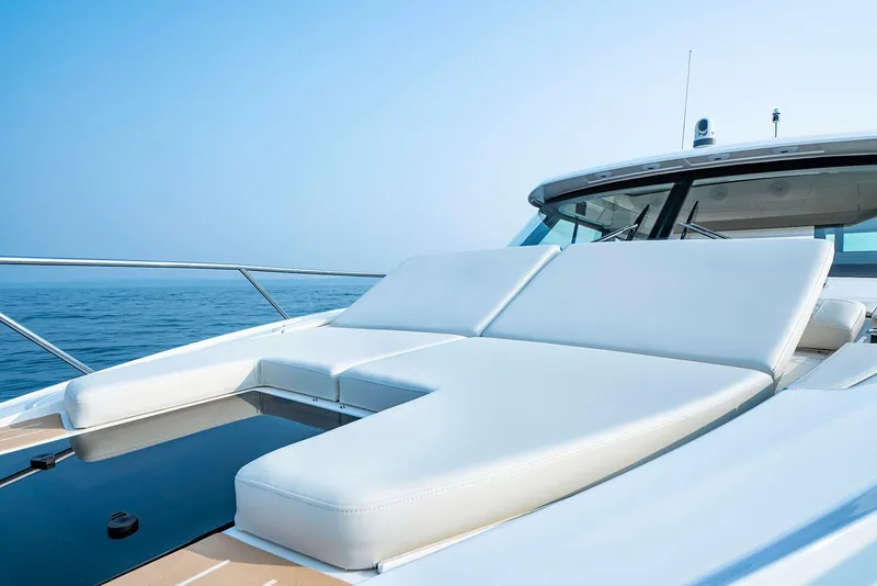 Slide: The Image of Manufacturer Provided Image: 2025 Tiara Yachts 48 LE luxury yacht with sleek deck and comfortable seating. - 8