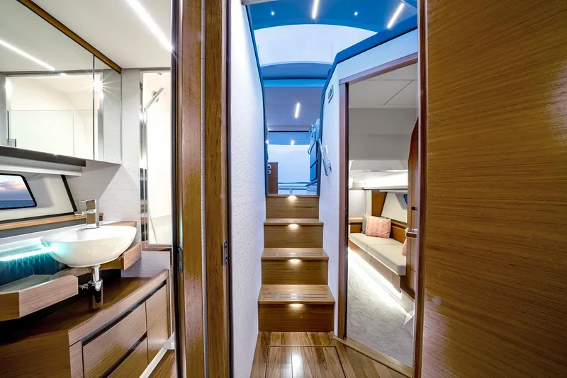 Slide: The Image of Manufacturer Provided Image: Luxurious interior of 2025 Tiara Yachts 48 LE, featuring modern design and elegant wood finishes. - 16