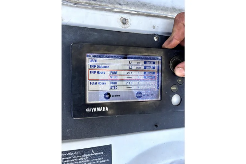 Slide: The Image of Yamaha screen displaying boat data such as distance traveled and engine hours. - 4