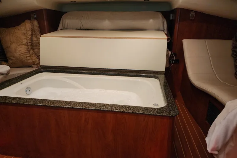 Slide: The Image of Luxurious interior of 2009 Hunter 50 Center Cockpit yacht featuring a built-in bathtub. - 86