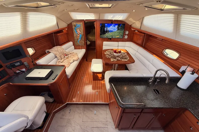 Slide: The Image of Luxurious 2009 Hunter 50 Center Cockpit interior with elegant seating and modern amenities. - 39