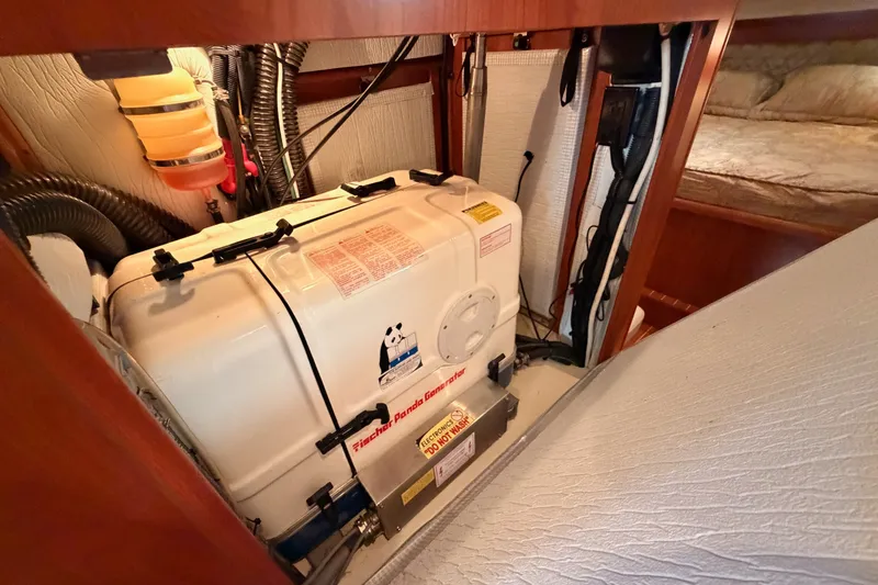 Slide: The Image of Engine room of 2009 Hunter 50 Center Cockpit yacht with Fischer Panda generator. - 105