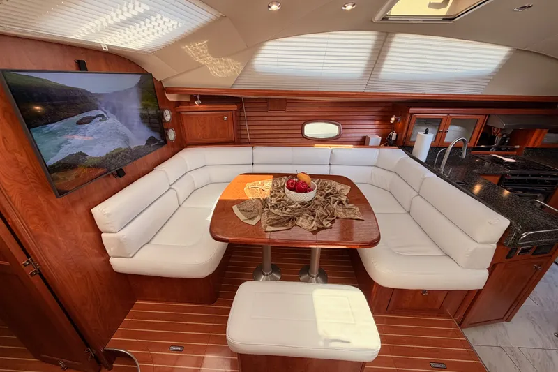 Slide: The Image of Luxurious 2009 Hunter 50 Center Cockpit interior with elegant seating and modern amenities. - 60