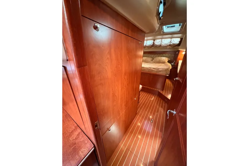 Slide: The Image of Luxurious wood interior of 2009 Hunter 50 Center Cockpit yacht cabin. - 79