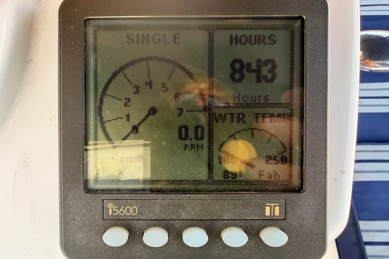 Slide: The Image of Digital display on 2009 Hunter 50 Center Cockpit showing engine hours and water temperature. - 32