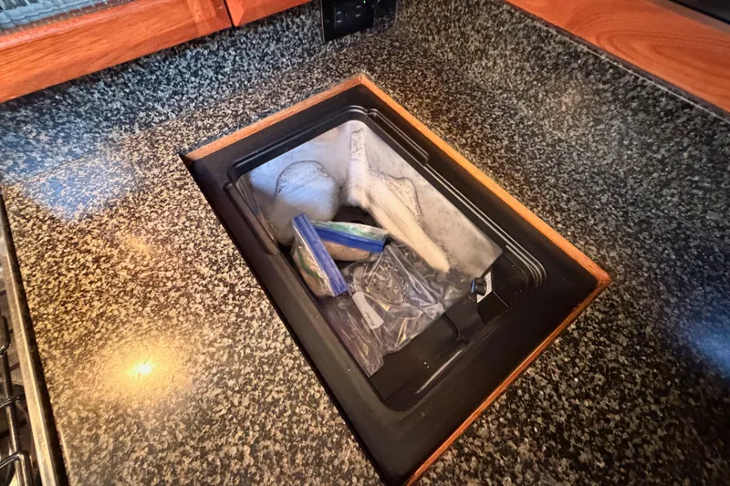 Slide: The Image of Granite countertop with built-in sink on 2009 Hunter 50 Center Cockpit yacht. - 55