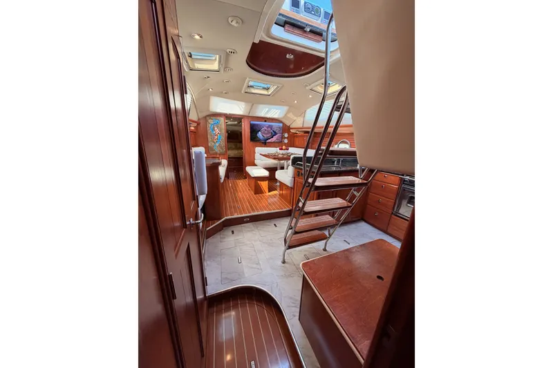 Slide: The Image of Luxurious interior of 2009 Hunter 50 Center Cockpit yacht with elegant wood finish. - 98