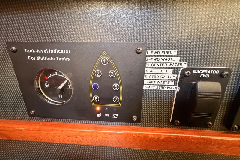 Slide: The Image of Tank-level indicator panel on 2009 Hunter 50 Center Cockpit yacht, showing multiple tank levels. - 46