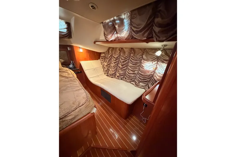 Slide: The Image of Luxurious interior of 2009 Hunter 50 Center Cockpit yacht with elegant wood finish. - 88