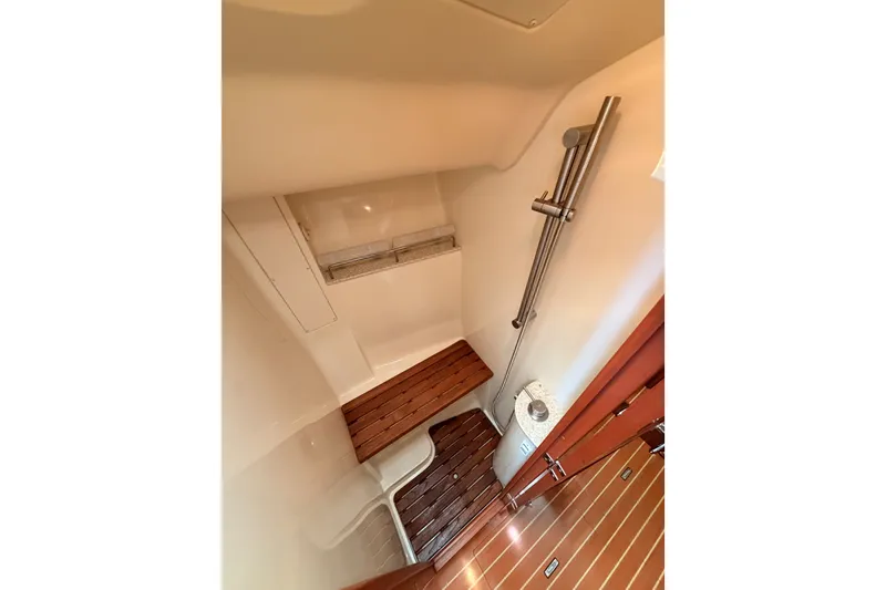 Slide: The Image of Shower area in 2009 Hunter 50 Center Cockpit yacht with wooden flooring. - 65