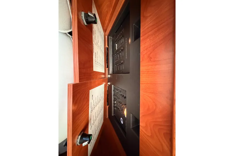 Slide: The Image of Control panel of a 2009 Hunter 50 Center Cockpit yacht with wooden finish. - 43