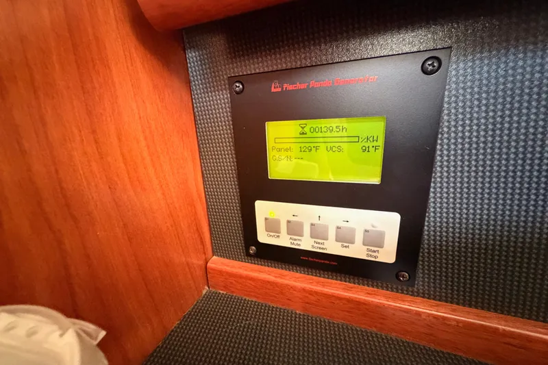 Slide: The Image of Control panel of a Fischer Panda generator on a 2009 Hunter 50 Center Cockpit yacht. - 44