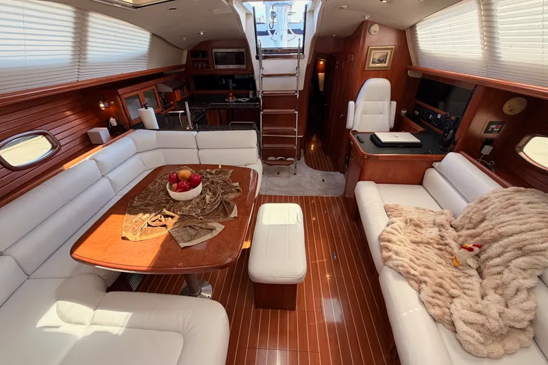 Slide: The Image of Luxurious interior of 2009 Hunter 50 Center Cockpit yacht with elegant seating and dining area. - 75