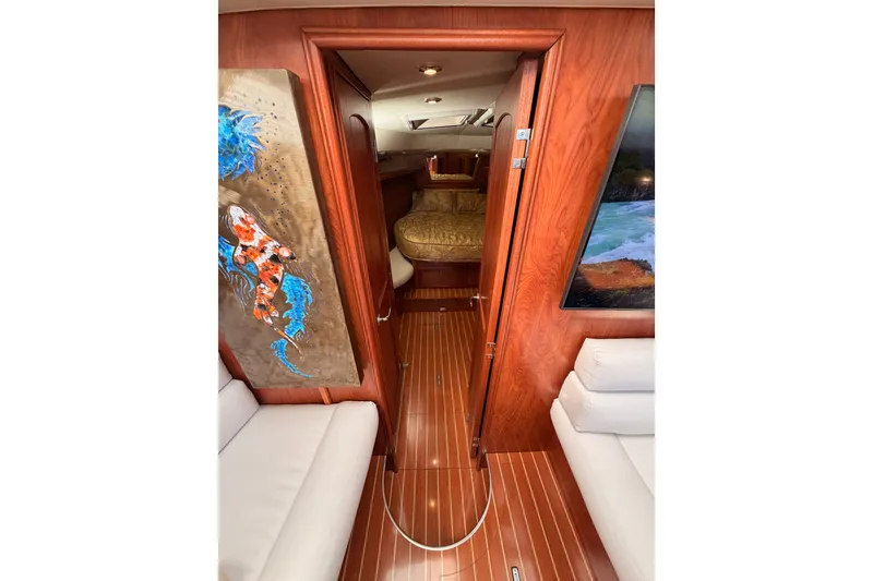 Slide: The Image of Luxurious interior of 2009 Hunter 50 Center Cockpit yacht with elegant wood finish. - 64