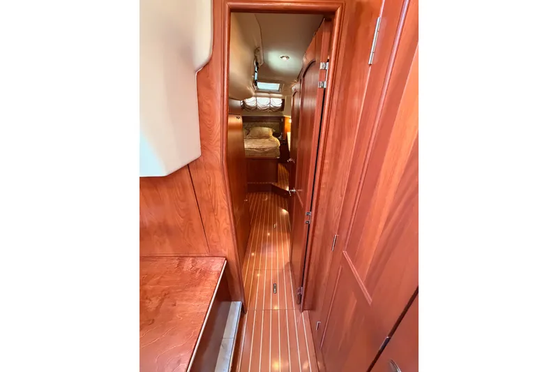Slide: The Image of Interior view of 2009 Hunter 50 Center Cockpit yacht with wooden finish. - 78