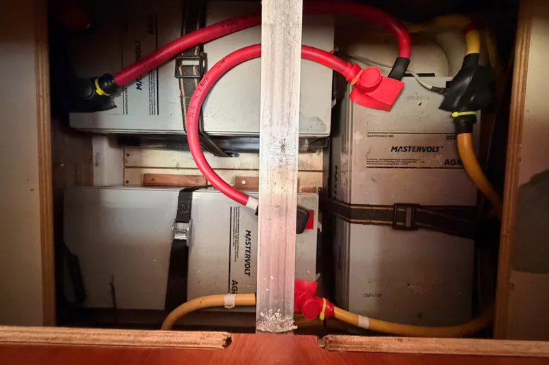 Slide: The Image of Battery compartment of a 2009 Hunter 50 Center Cockpit sailboat with Mastervolt AGM batteries. - 110