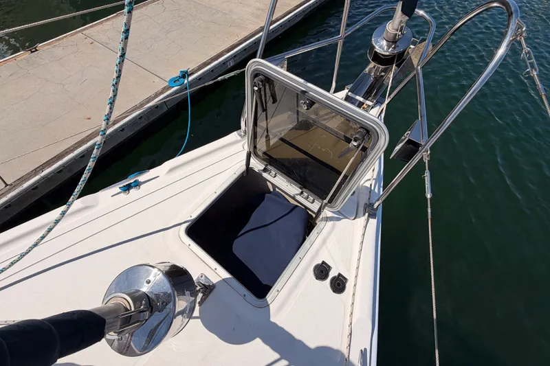 Slide: The Image of Open hatch on 2009 Hunter 50 Center Cockpit sailboat docked at marina. - 22