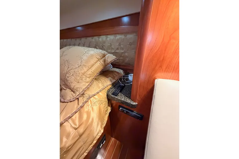 Slide: The Image of Luxurious cabin interior of 2009 Hunter 50 Center Cockpit yacht with elegant bedding. - 89