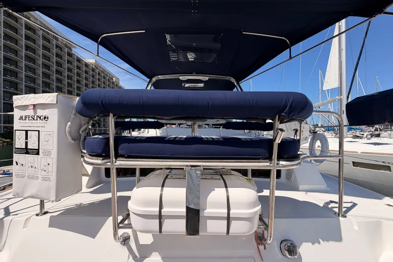 Slide: The Image of 2009 Hunter 50 Center Cockpit yacht with blue seating and lifesaving equipment on deck. - 13