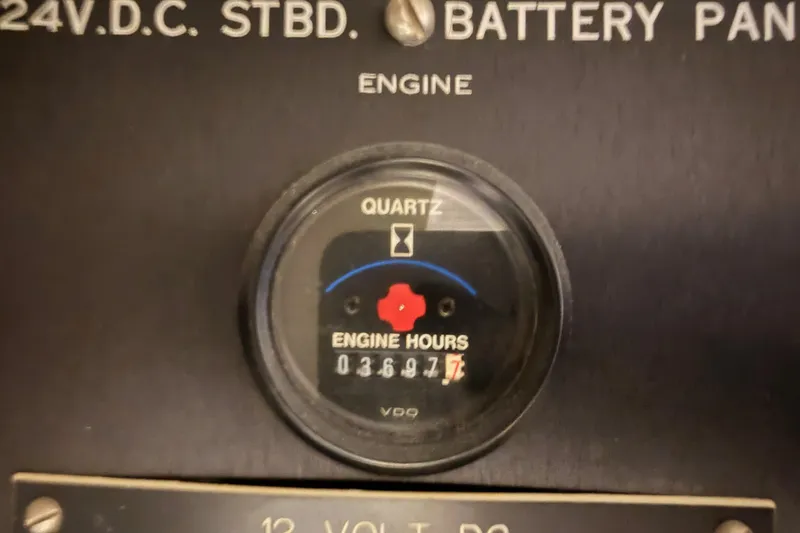Slide: The Image of Engine hour meter reading 3697.7 on 1996 Hatteras 70 Sport Deck Motor Yacht. - 92