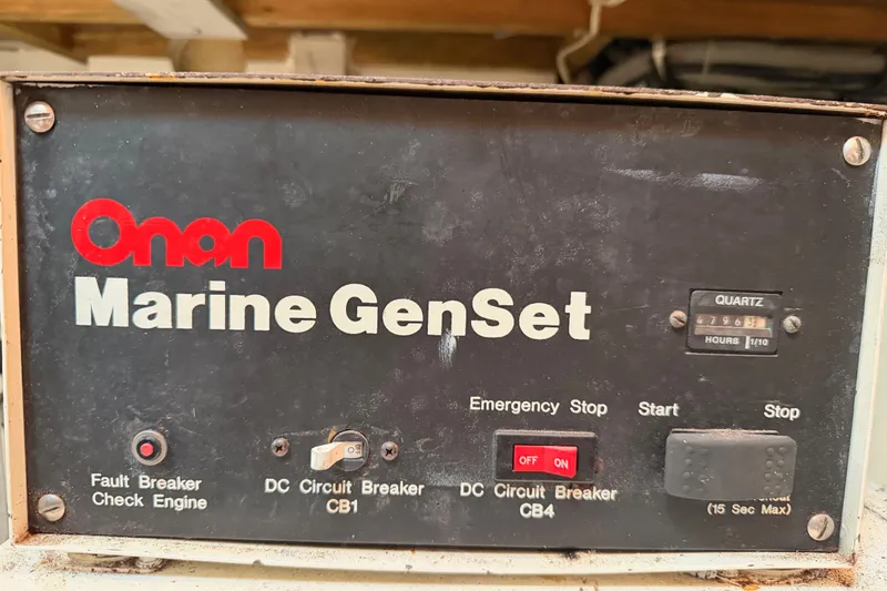 Slide: The Image of Onan Marine GenSet control panel on 1996 Hatteras 70 Sport Deck Motor Yacht. - 94
