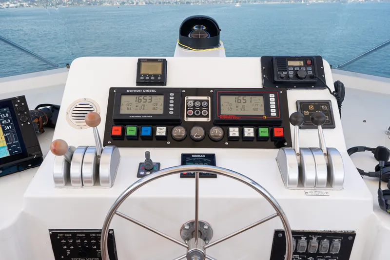 Slide: The Image of Helm of 1996 Hatteras 70 Sport Deck Motor Yacht with Detroit Diesel controls. - 25