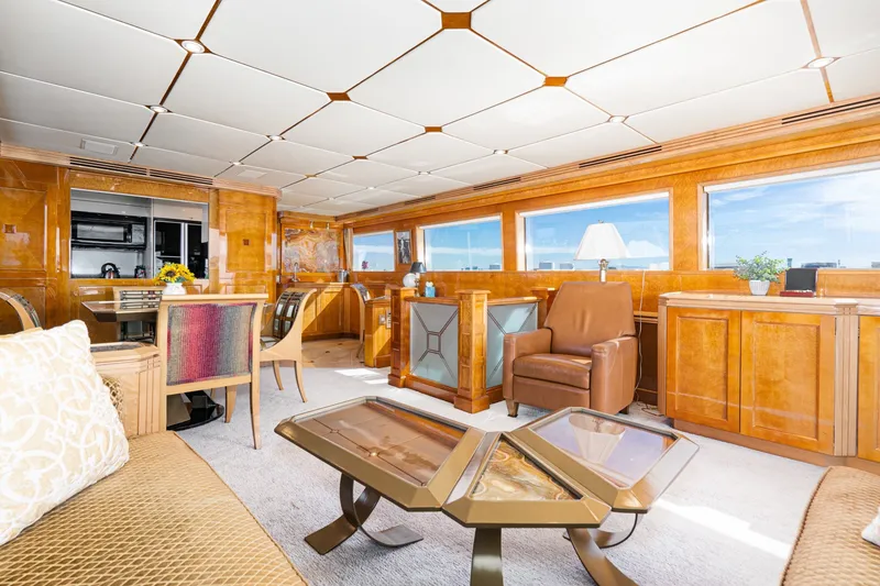 Slide: The Image of Luxurious interior of 1996 Hatteras 70 Sport Deck Motor Yacht with elegant furnishings. - 32