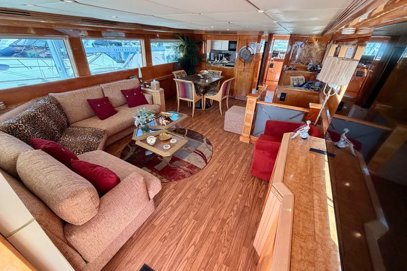 Slide: The Image of Luxurious interior of 1996 Hatteras 70 Sport Deck Motor Yacht with elegant furnishings. - 35