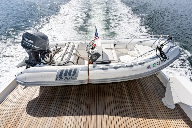 Slide: The Image of Novurania tender on 1996 Hatteras 70 Sport Deck Motor Yacht with Yamaha outboard engine. - 13
