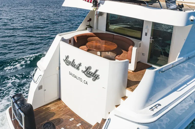 Slide: The Image of 1996 Hatteras 70 Sport Deck Motor Yacht with elegant seating, named "Loveliest Lady," Sausalito, CA. - 27