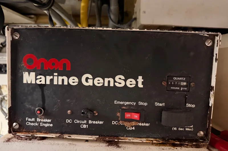 Slide: The Image of Onan Marine GenSet control panel on 1996 Hatteras 70 Sport Deck Motor Yacht. - 96
