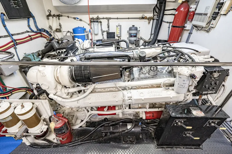 Slide: The Image of Engine room of a 1996 Hatteras 70 Sport Deck Motor Yacht with Detroit Diesel engine. - 73