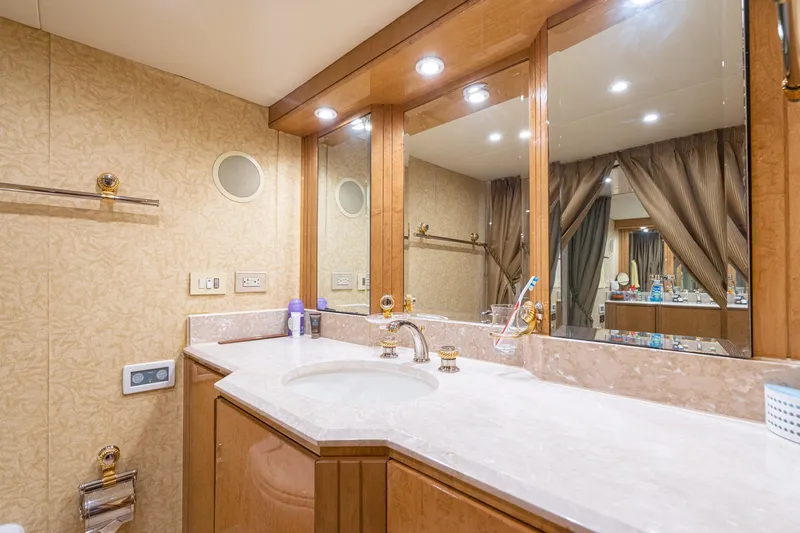 Slide: The Image of Luxurious bathroom interior of 1996 Hatteras 70 Sport Deck Motor Yacht with elegant fixtures. - 54