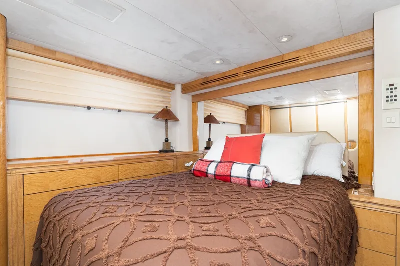 Slide: The Image of Luxurious bedroom interior of 1996 Hatteras 70 Sport Deck Motor Yacht. - 61